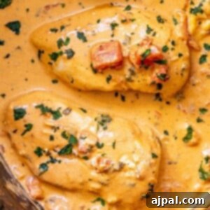 picture of creamy tomato basil chicken in a slow cooker