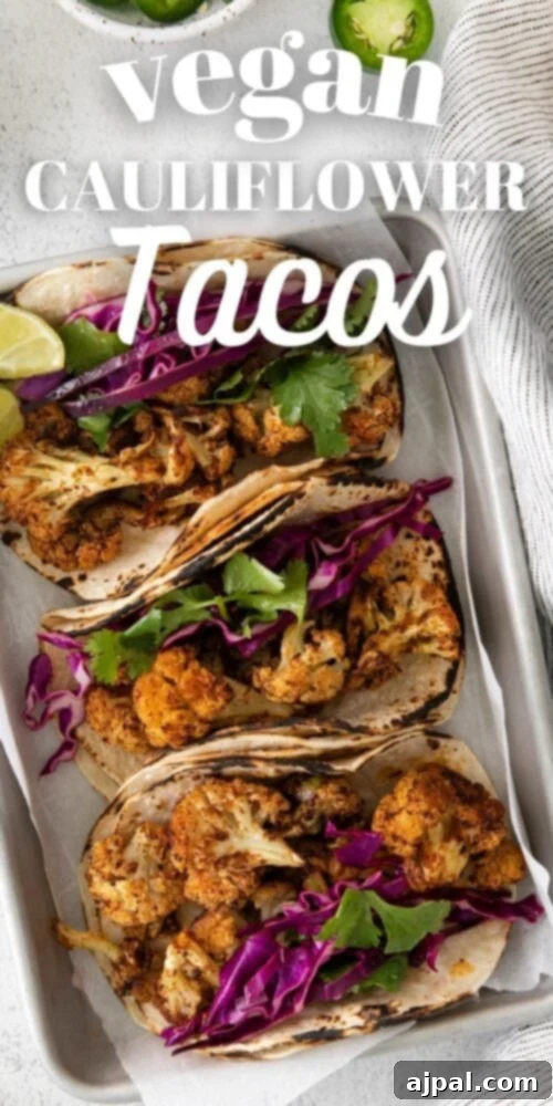 Your New Favorite Vegan Cauliflower Tacos 17 picture of cauliflower tacos with vegan crema and slaw in a metal tray