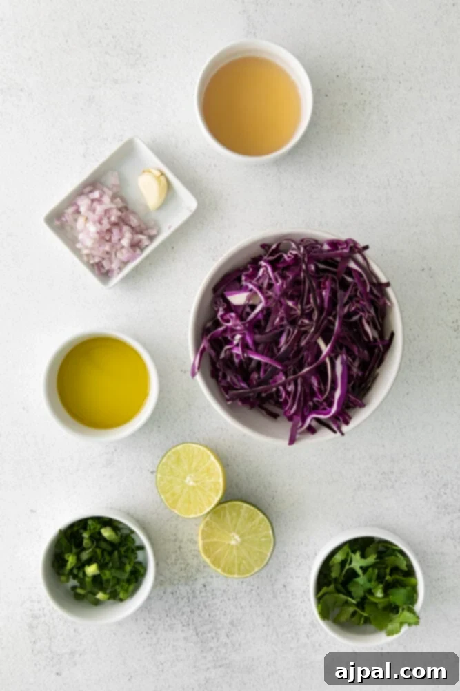Your New Favorite Vegan Cauliflower Tacos 8 picture of cabbage, lime juice, shallot, garlic, green onion on a table