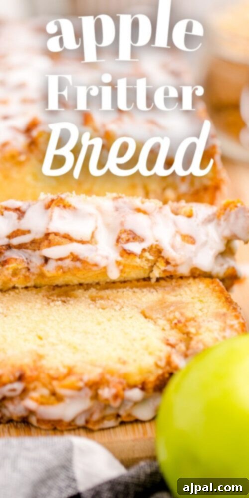 A stunning vertical shot of sliced apple fritter bread on a wooden cutting board, showcasing its rich layers and glaze.