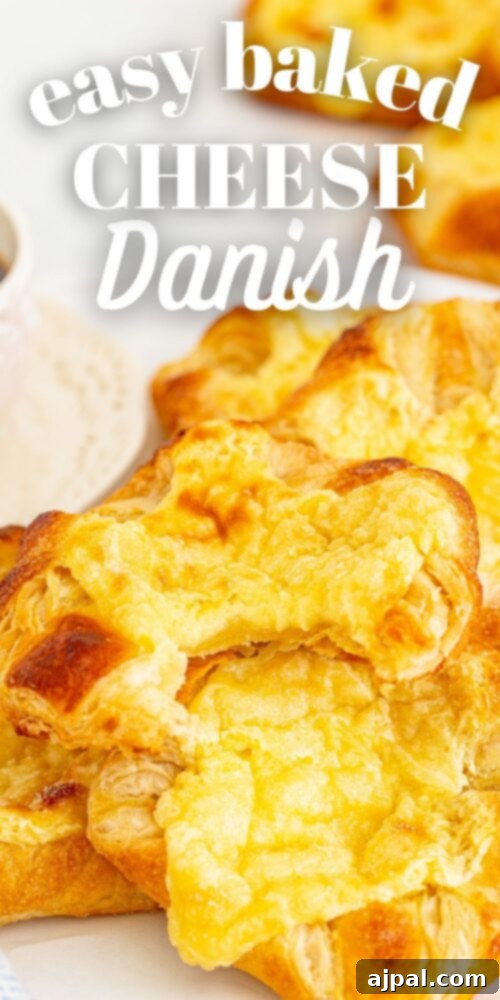 A beautifully golden-brown cheese danish with a rich, creamy filling, served on a plate next to a cup of coffee, creating an enticing breakfast scene.