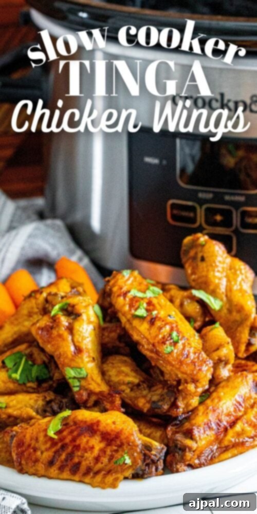 Smoky Tinga Slow Cooker Wings 11 A beautifully composed shot of slow cooker tinga chicken wings, a perfect recipe for any occasion.