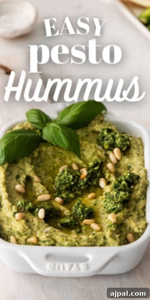 Vibrant Pesto Hummus 11 picture of pesto hummus in white bowl