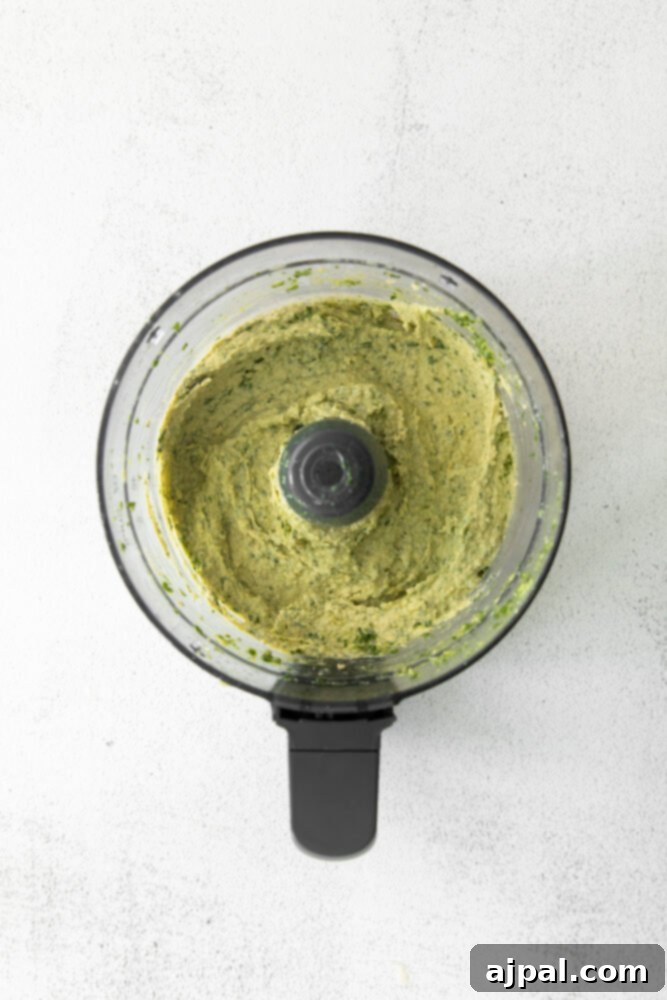 Vibrant Pesto Hummus 7 picture of pesto hummus in food processor