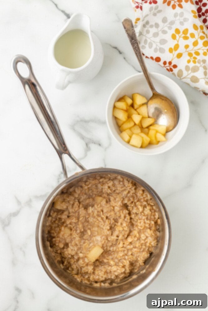 Step-by-step on how to make apple cinnamon oatmeal.