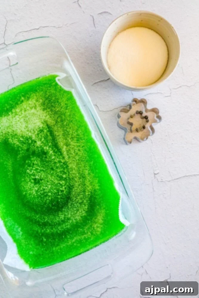 picture of gelatin, sugar, and shamrock cookie cutter on a table