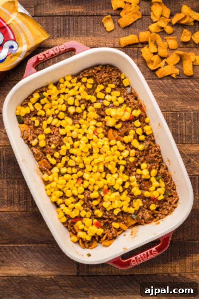 fritos beef and corn in a casserole dish