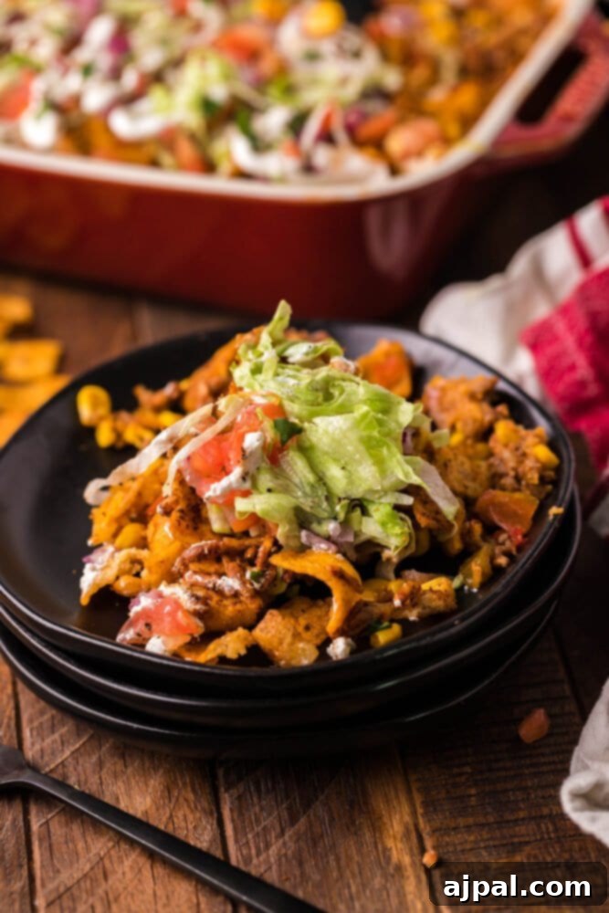picture of frito pie casserole in a baking dish
