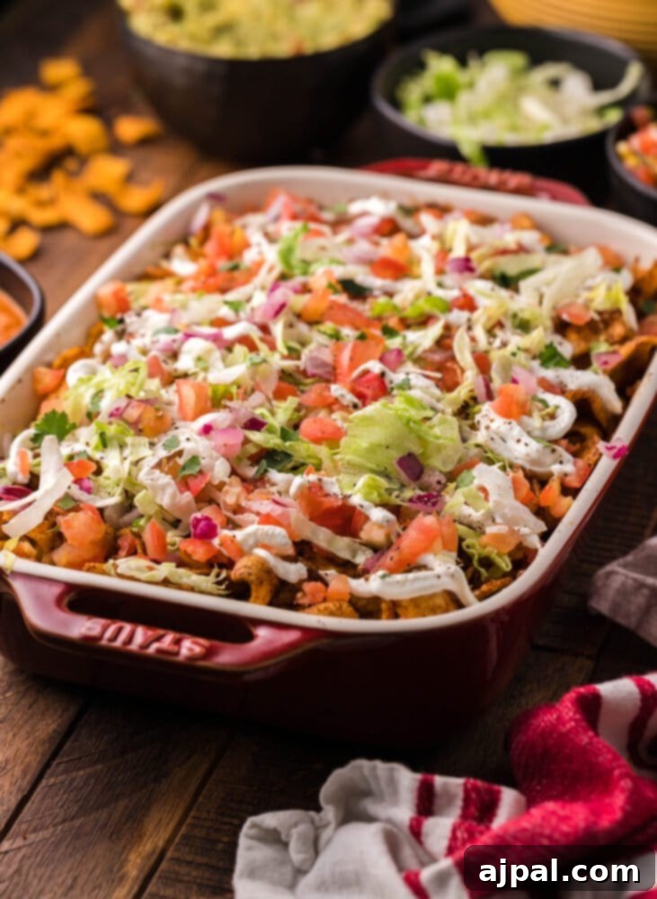 picture of frito pie casserole in a baking dish