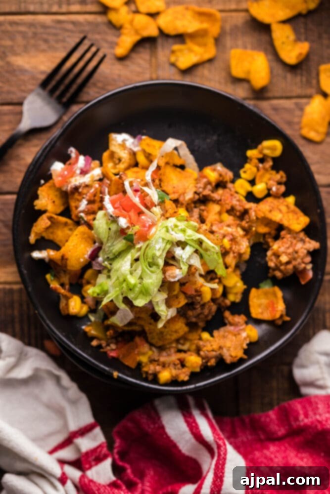 picture of frito pie casserole in a baking dish