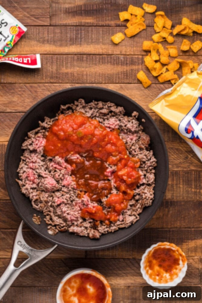 salsa and ground beef in a pan