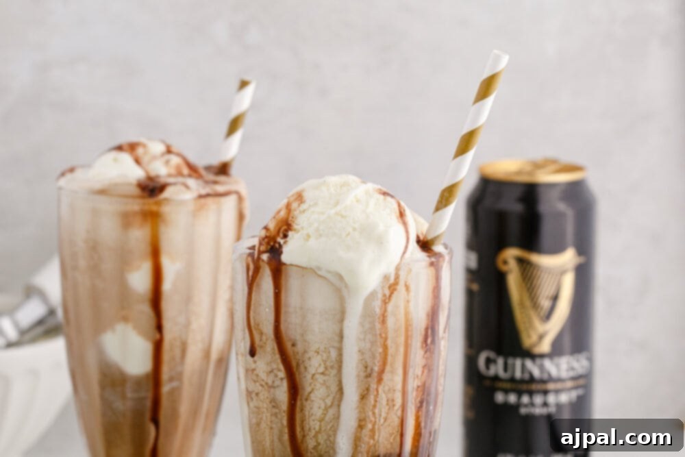 Guinness Baileys Float Delight 11 Picture of Guinness float in a glass with a gold paper straw and chocolate syrup