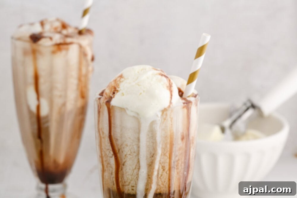 Guinness Baileys Float Delight 10 Irish-themed ice cream sundaes featuring Baileys and Guinness, topped with whipped cream and chocolate syrup.
