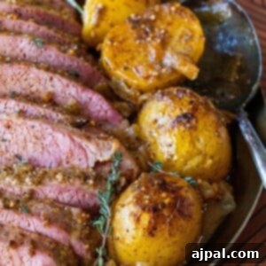 picture of corned beef on a platter with potatoes