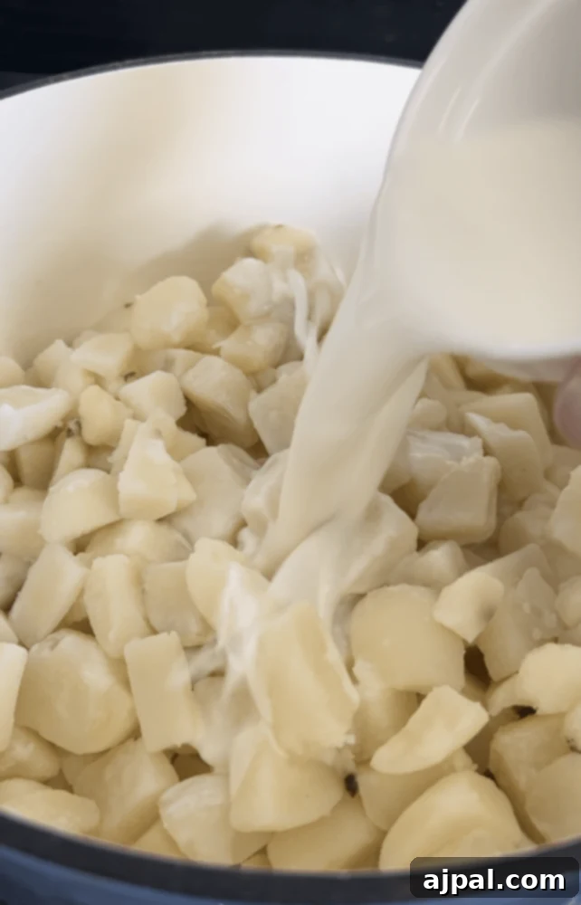 picture of milk and potatoes in a pan