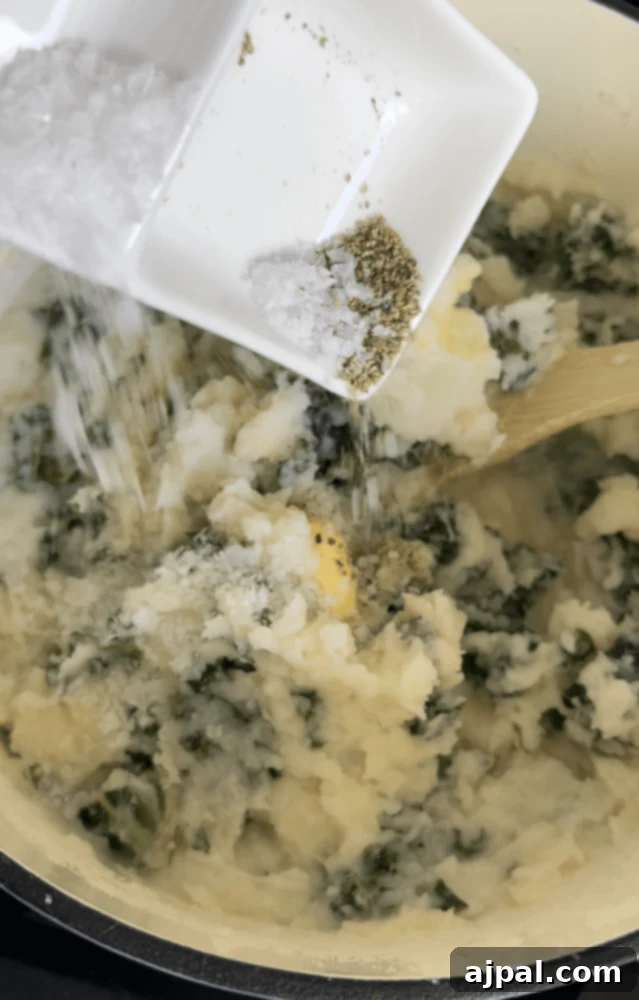 picture of potatoes and kale in a pan 