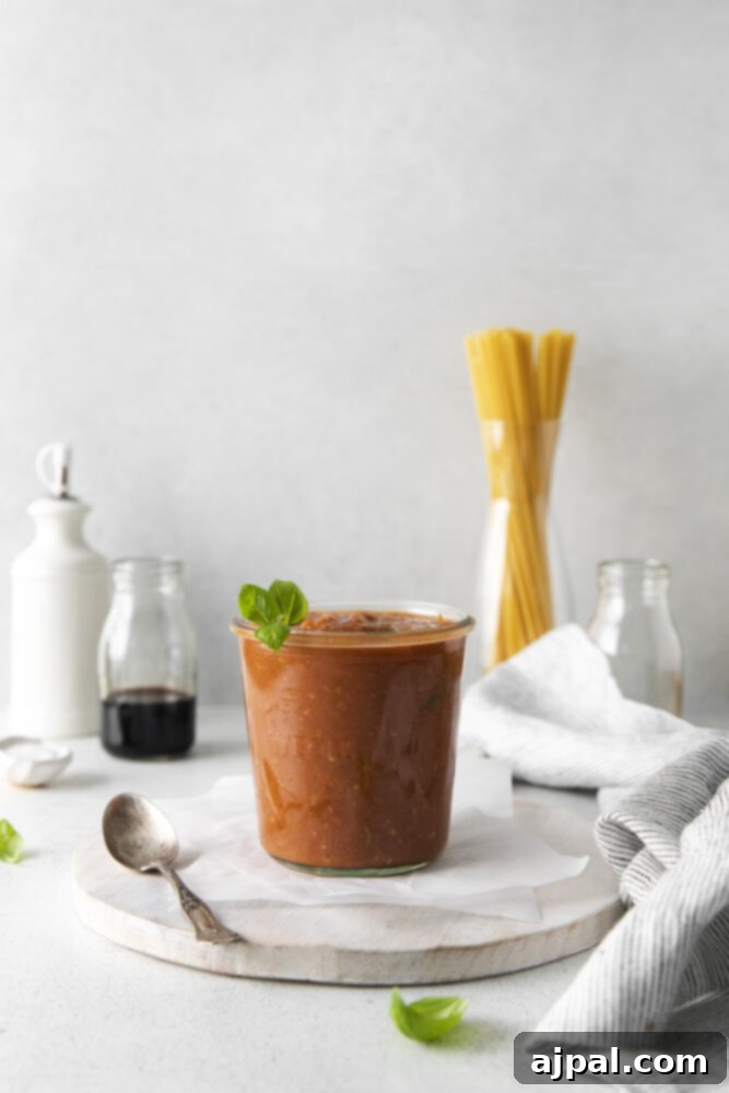 Deep Roasted Tomato Marinara 11 A bowl of roasted tomato marinara sauce, highlighting its rich texture and color.
