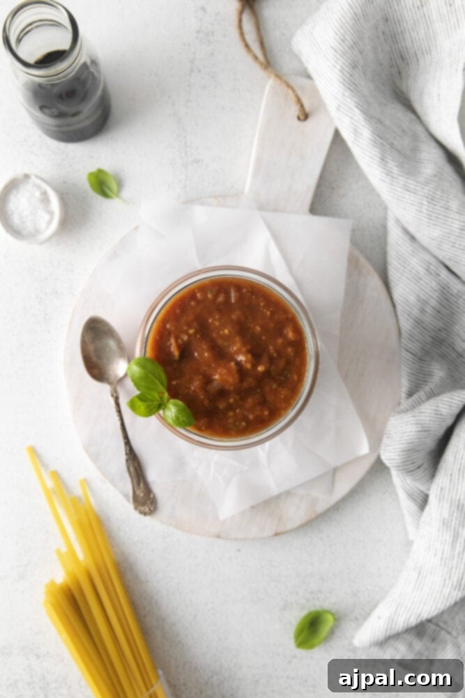 Deep Roasted Tomato Marinara 10 A bowl of vibrant roasted tomato marinara sauce, perfect for serving.