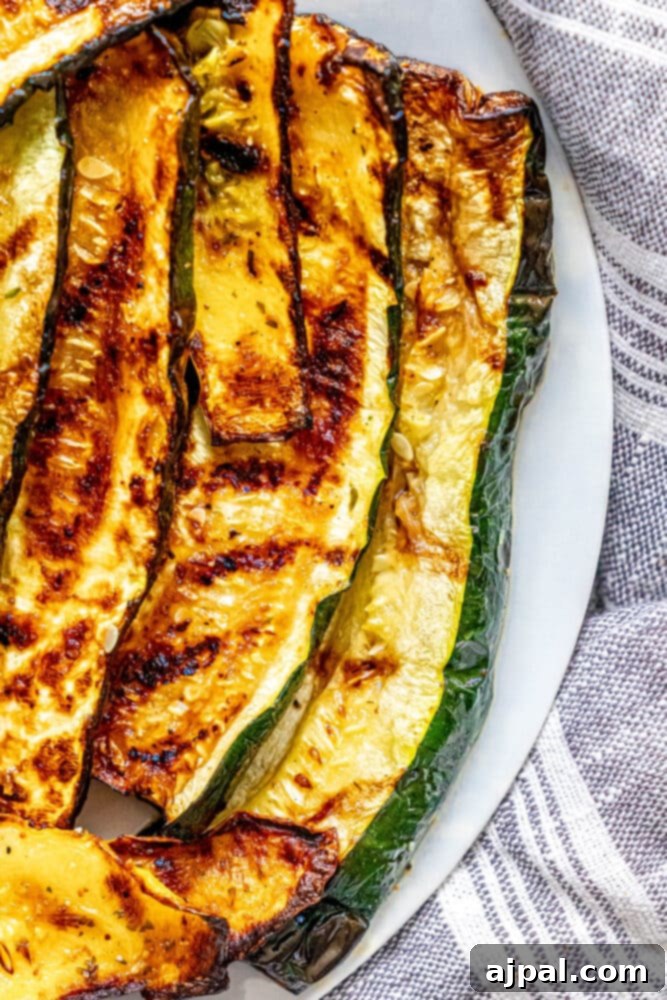 Grilled Summer Squash Medley 2 picture of grilled zucchini and squash on a white plate