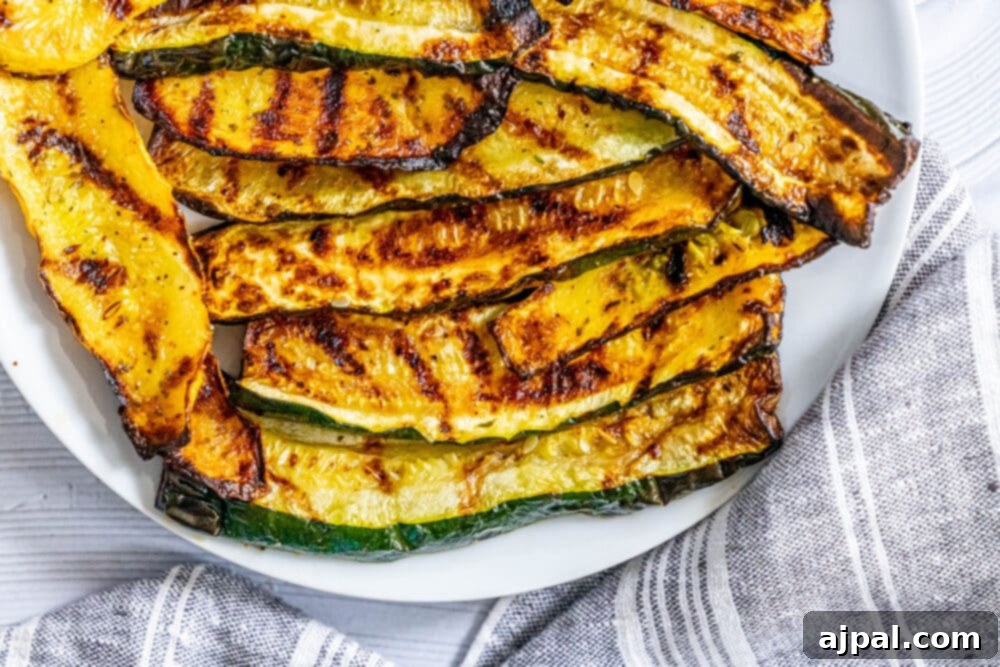 Grilled Summer Squash Medley 11 picture of grilled zucchini and squash on a white plate