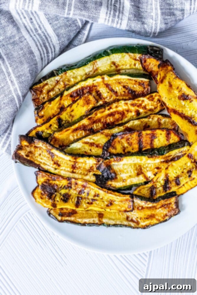 Grilled Summer Squash Medley 12 picture of grilled zucchini and squash on a white plate