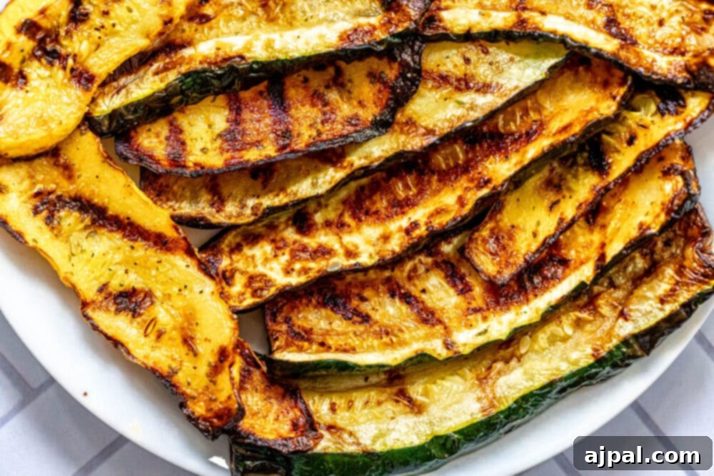 Grilled Summer Squash Medley 3 picture of grilled zucchini and squash on a white plate