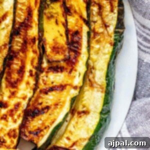 Grilled Summer Squash Medley 14 picture of grilled zucchini and squash on a white plate