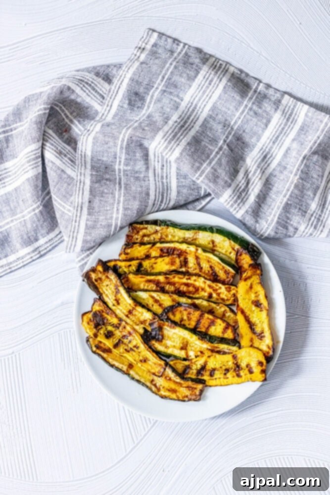 Grilled Summer Squash Medley 4 picture of grilled zucchini and squash on a white plate