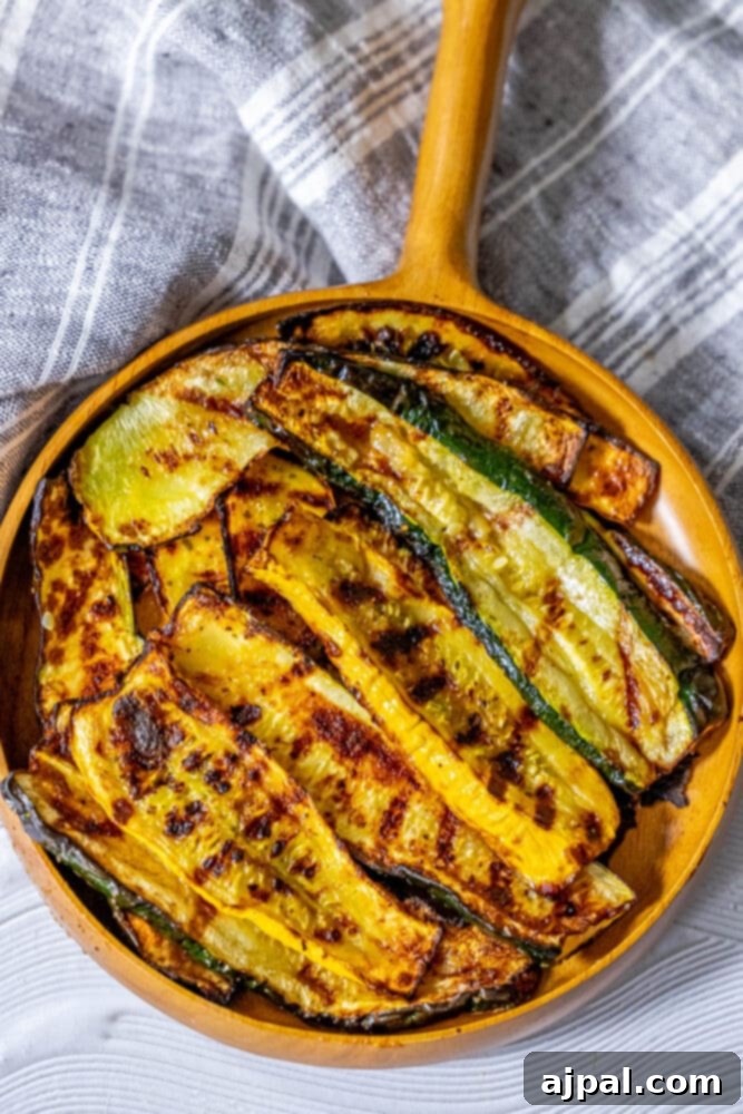 Grilled Summer Squash Medley 9 picture of grilled zucchini and squash on a white plate