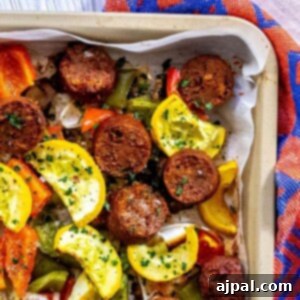 One-Pan Vegan Chorizo Veggie Bake 13 picture of vegan chorizo sausage bake on a baking sheet