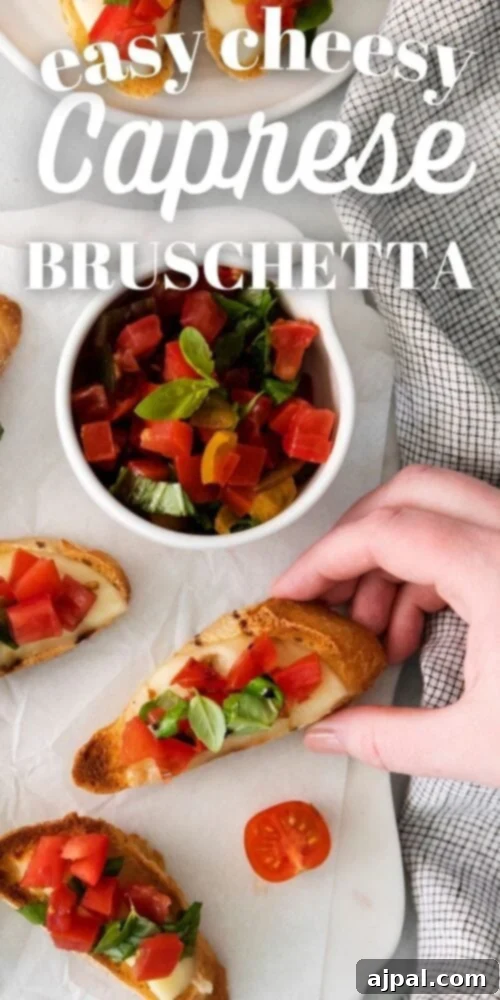 Vibrant Caprese Toasts 11 Easy baked Caprese Bruschetta recipe displayed on a dark surface, highlighting the vibrant colors and fresh ingredients.
