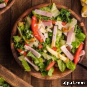 picture of julienne kale salad in a bowl on a table