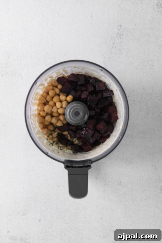 Vibrant Roasted Beet Hummus 6 picture of beets and chickpeas in a food processor