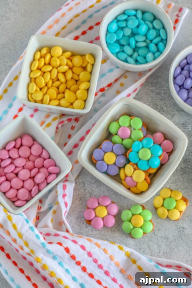 Hoppy Easter Pretzels 10 A bowl of Easter pretzel snacks surrounded by loose colorful candies, emphasizing their festive appeal.