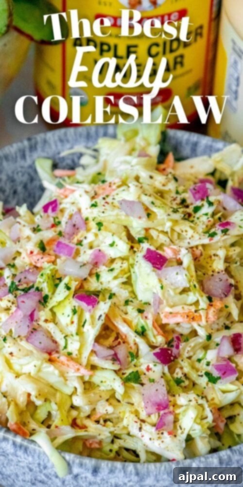 Quick & Easy 4-Ingredient Coleslaw 8 Beautifully prepared coleslaw in a blue serving bowl, ready to be enjoyed.