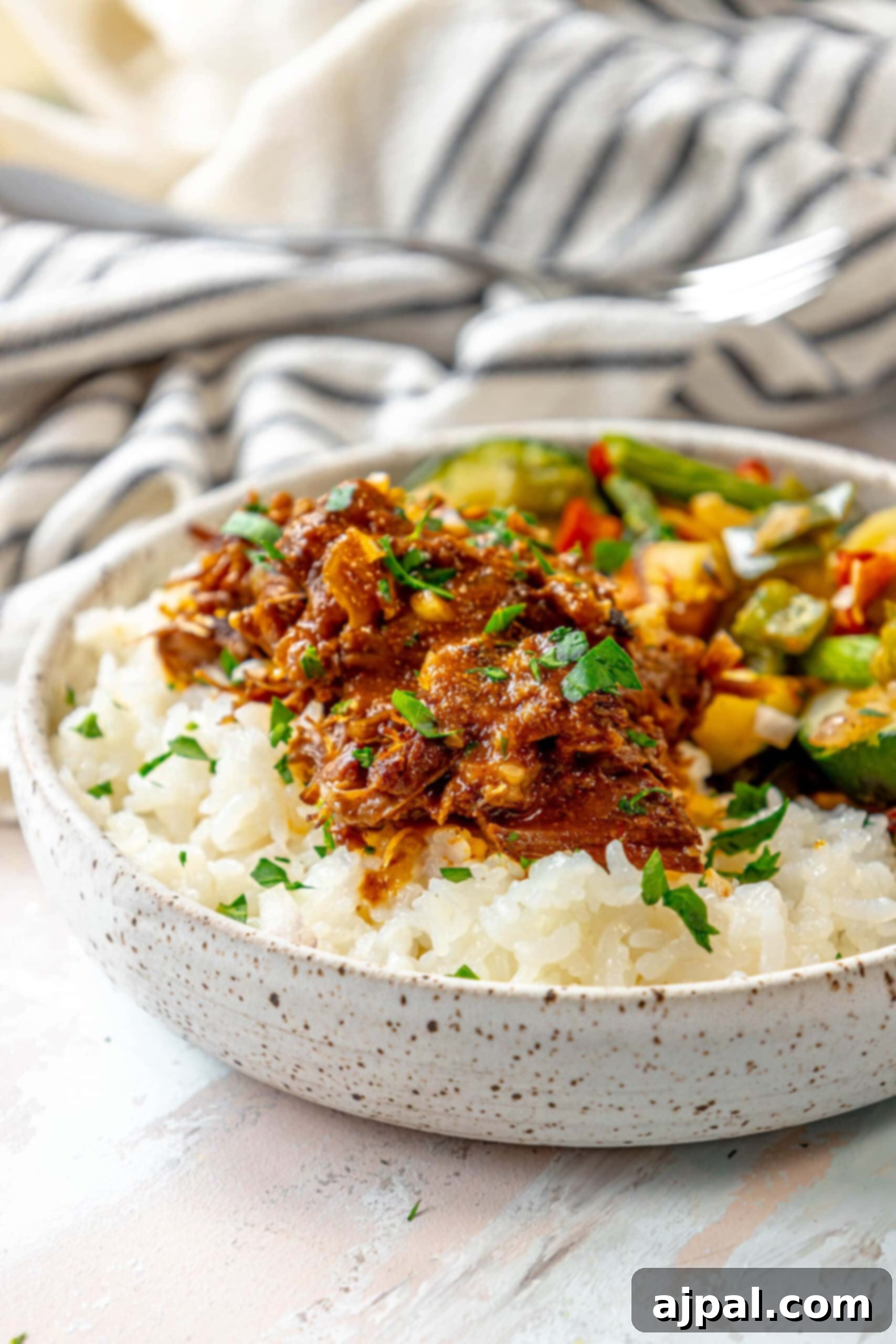 A bowl of rice with beef and vegetables in it, prepared with Instant Pot.