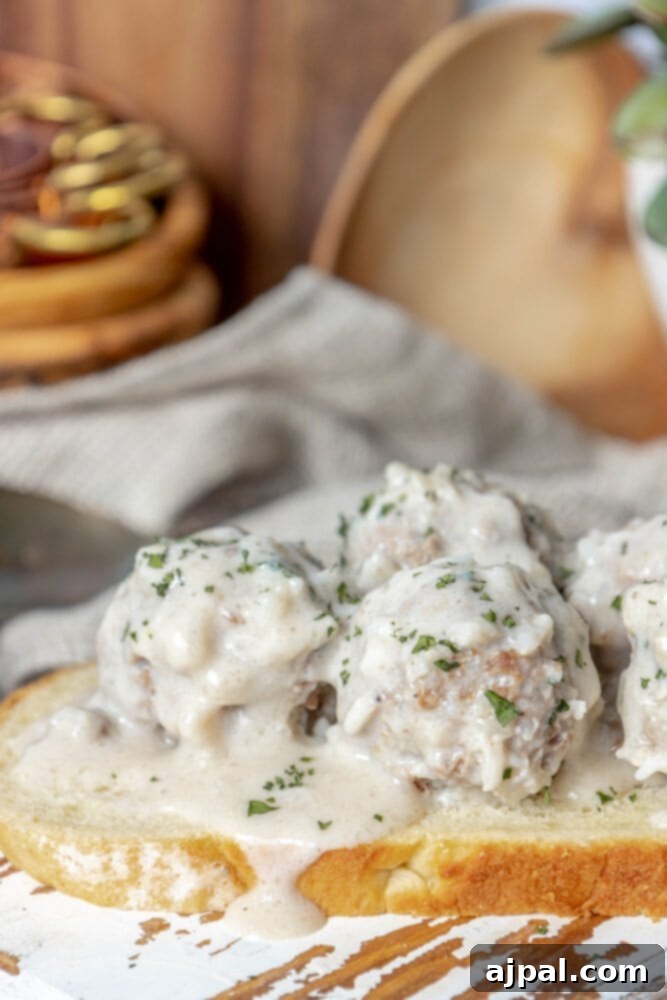 Easy Creamy Instant Pot Porcupine Meatballs 2 picture of creamy porcupine meatballs on a slice of sourdough bread