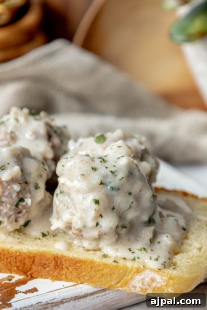 Easy Creamy Instant Pot Porcupine Meatballs 11 picture of creamy porcupine meatballs on a slice of sourdough bread
