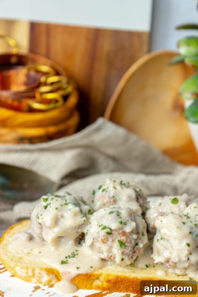 Easy Creamy Instant Pot Porcupine Meatballs 3 picture of creamy porcupine meatballs on a slice of sourdough bread