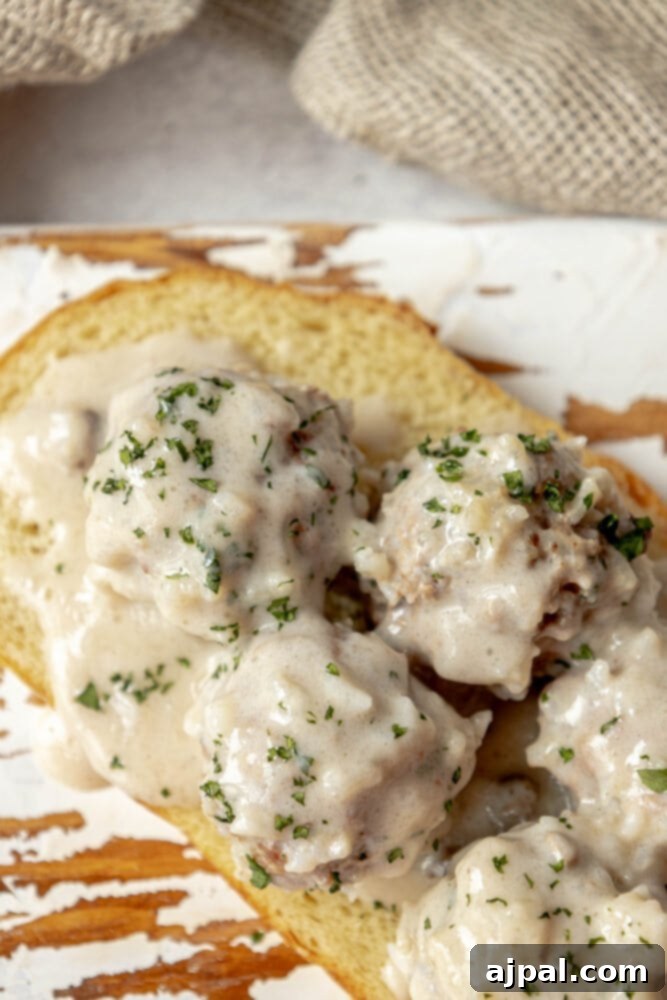 Easy Creamy Instant Pot Porcupine Meatballs 4 picture of creamy porcupine meatballs on a slice of sourdough bread