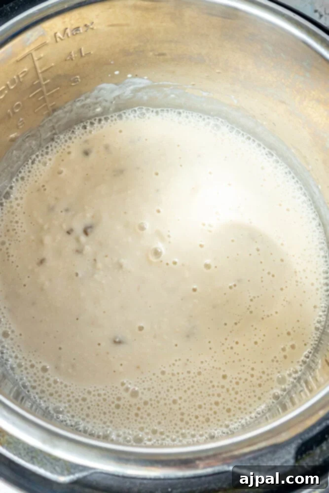 Easy Creamy Instant Pot Porcupine Meatballs 8 picture of can of condensed cream of mushroom soup in an instant pot