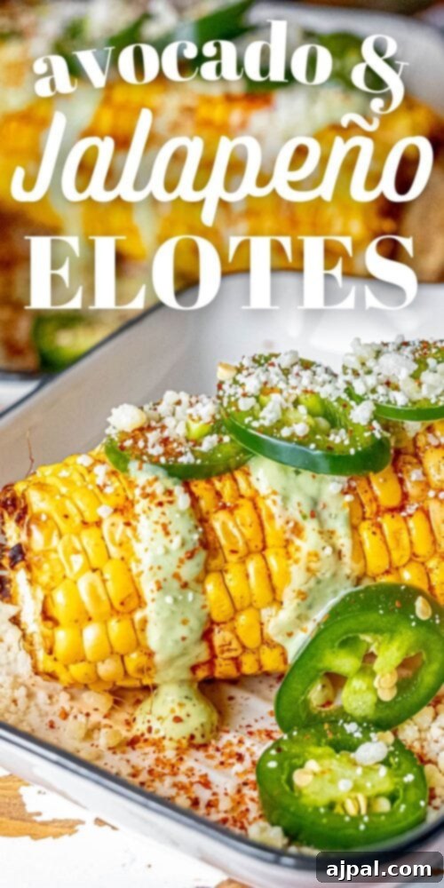 Avocado and jalapeno elotes topped with avocado crema, garnished with cilantro and cheese