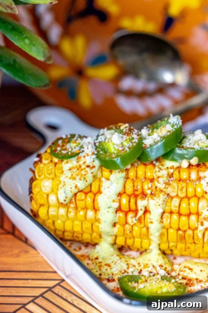 Another view of the delicious Avocado Jalapeno Elotes, garnished with fresh ingredients