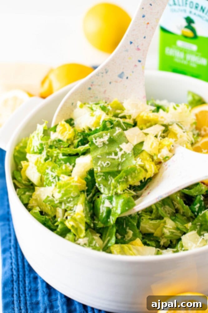 Crunchy Caesar-style salad with a modern twist of lemon and generous parmesan cheese, inspired by trending recipes.