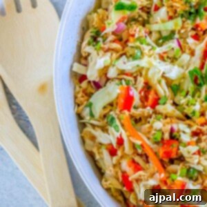 Picture of Thai chicken salad in a white bowl on a table