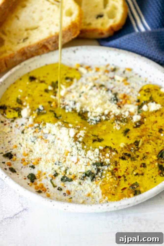 Effortless Bread Dip Perfection 7 A visual guide featuring a bowl with dried herbs, spices, and Parmesan cheese, illustrating the initial steps for preparing a homemade bread dip.
