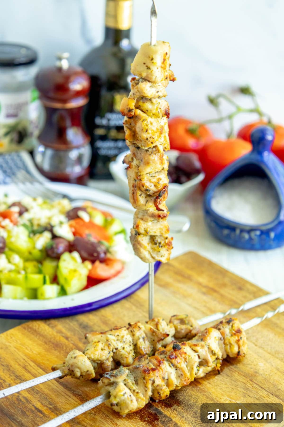 A stunning spread of grilled chicken souvlaki skewers, perfectly cooked and ready to be enjoyed