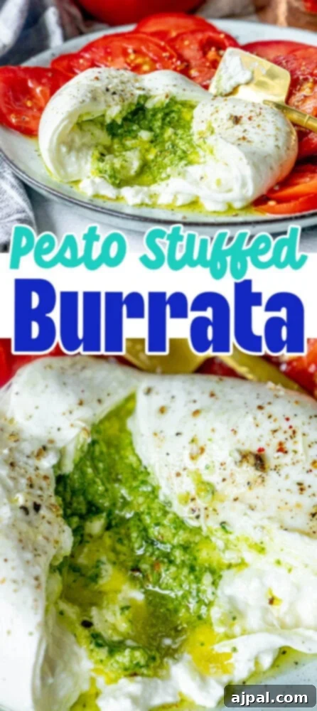 Burrata Bursting with Pesto 11 picture of burrata sliced open with pesto spilling out on a plate with tomatoes