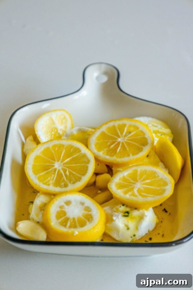 Warm Goat Cheese Bites 8 goat cheese being marinated in olive oil with garlic and lemon