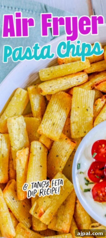 Crispy air-fried pasta chips served with a creamy feta dip, beautifully presented for a delightful snack.